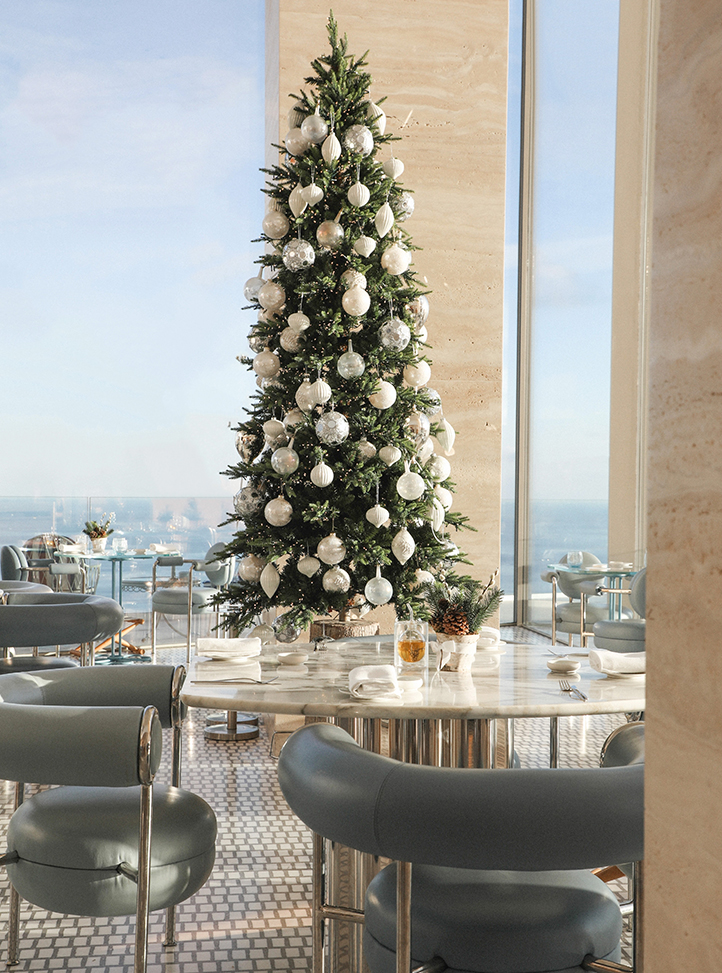 Christmas tree with white decorations at the Riviera Restaurant.